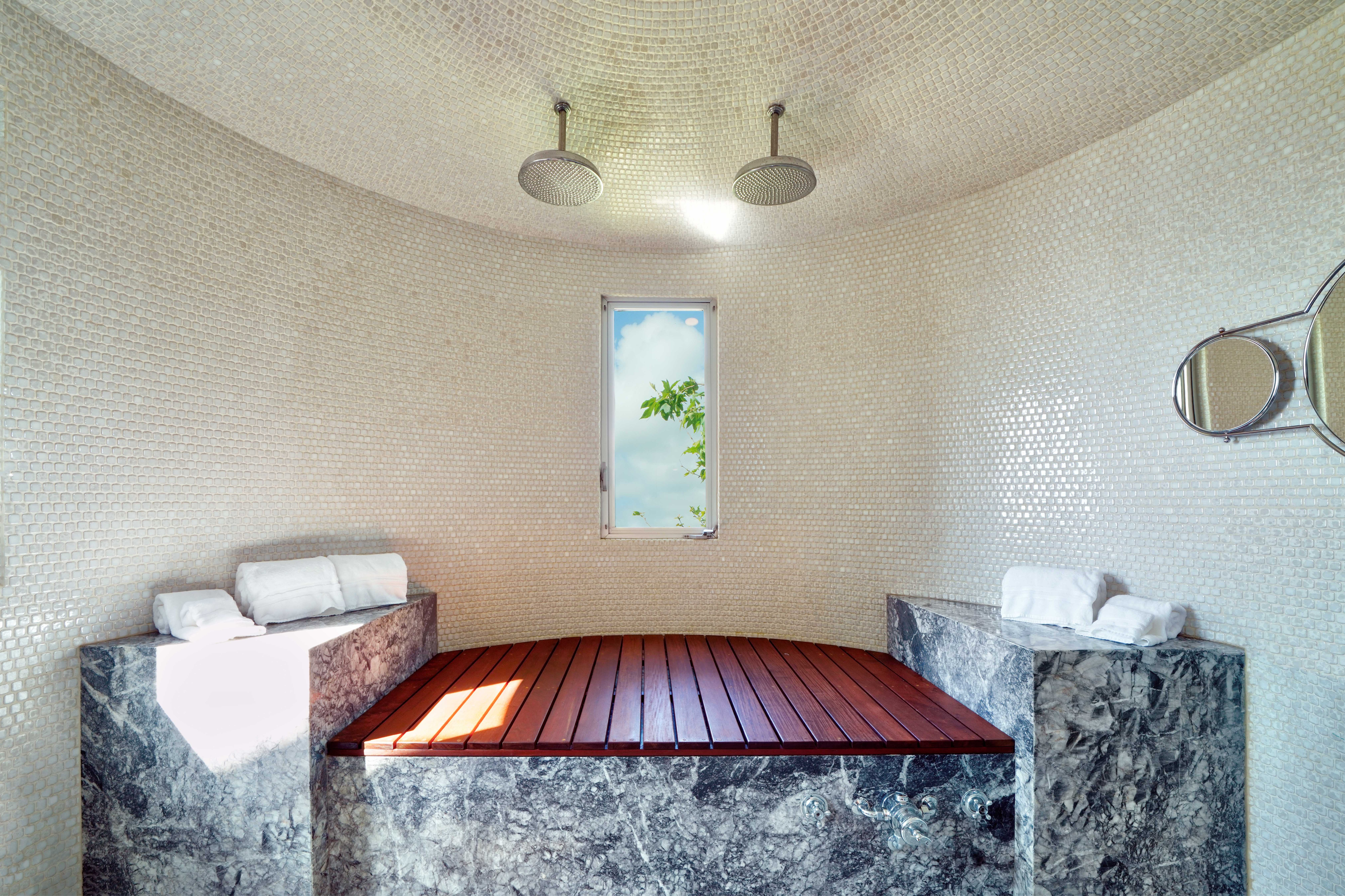 Steam room with mosaic tile dome