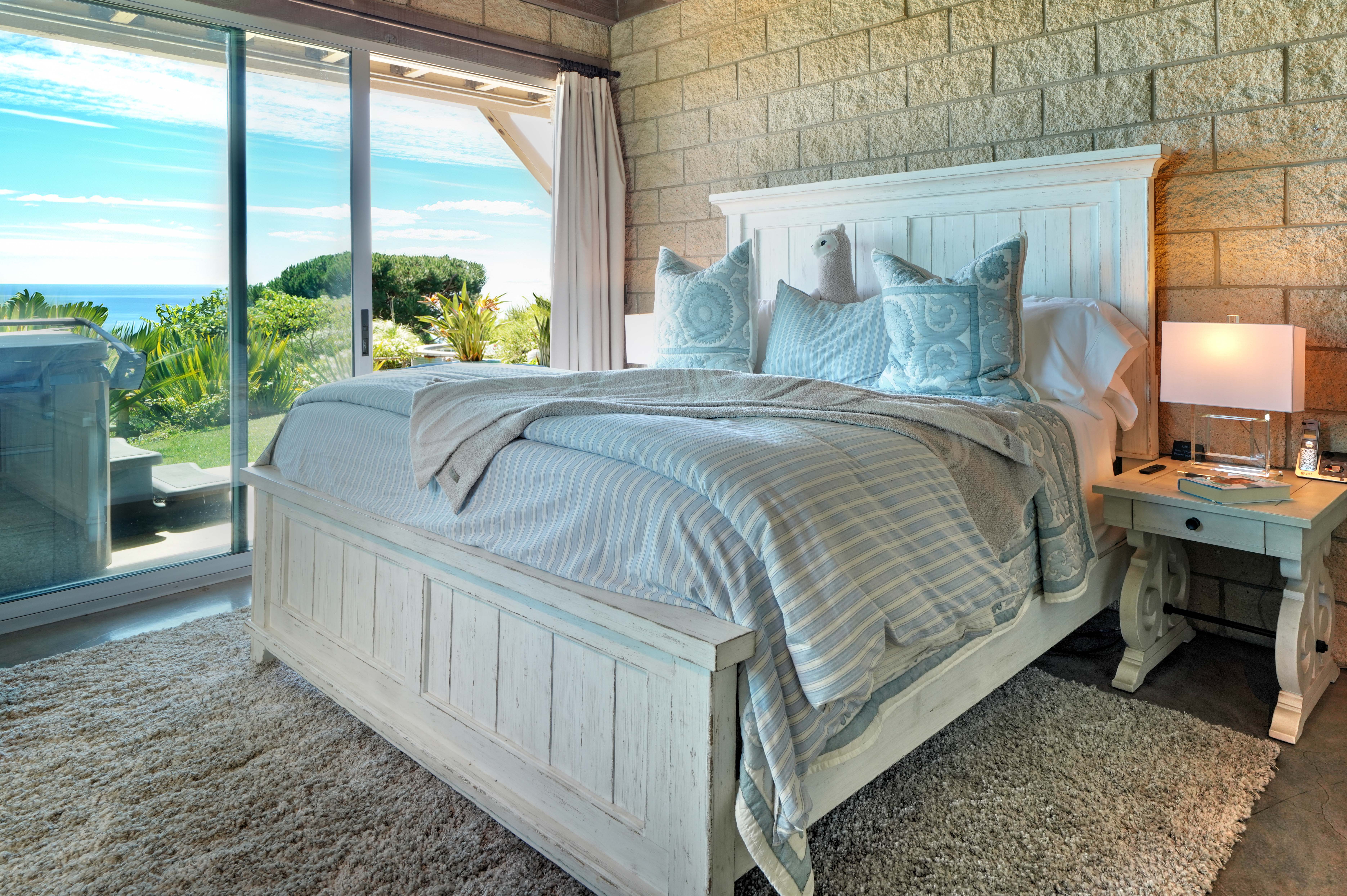 Coastal bedroom with barn door