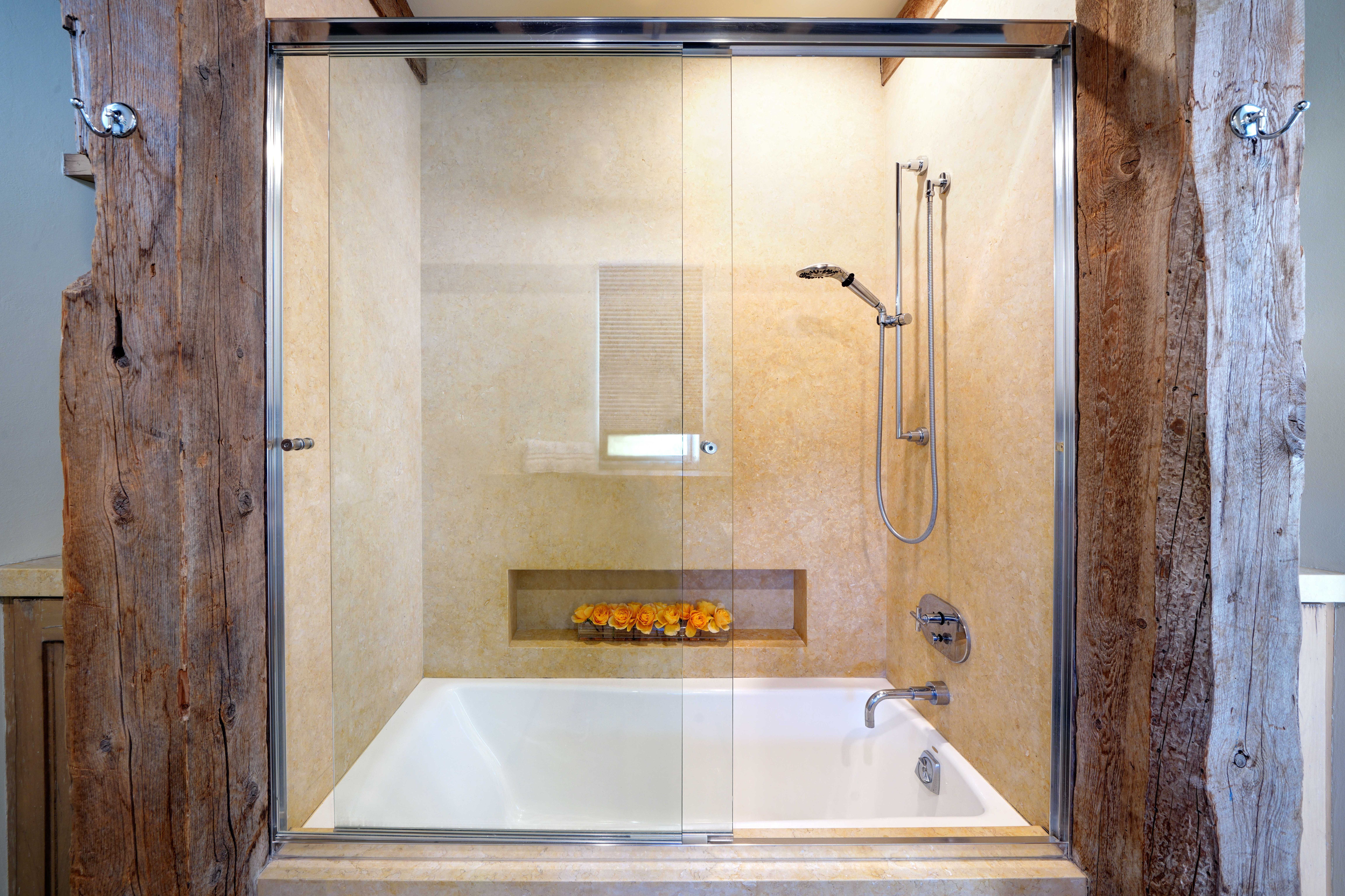 Tub shower with reclaimed wood frame